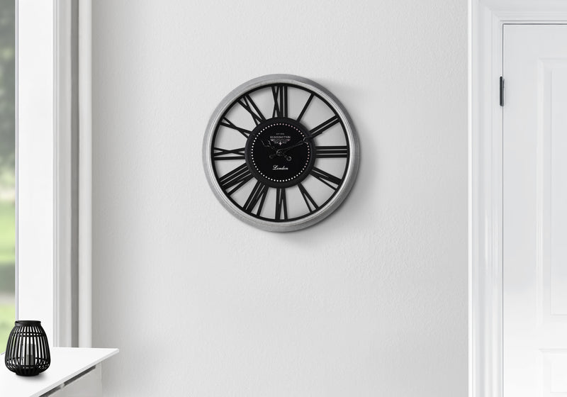 Horloge murale ronde de transition de 16 po en argent et noir